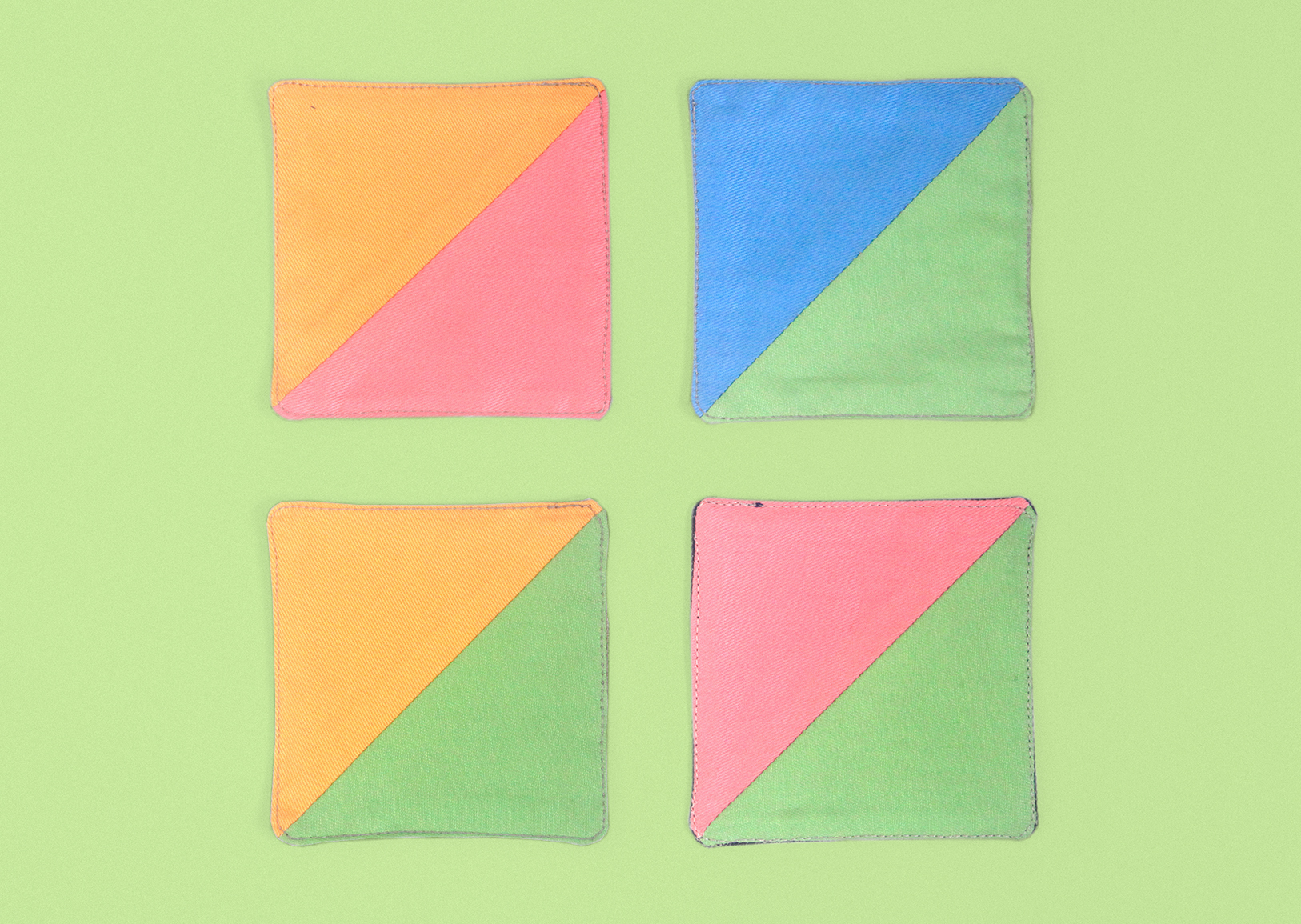 4 cup mats diagonal multi-fabric on one side and miscellenous fabric the other side, accessories merchandising, styling, uniform design, apron, blue white gingham check, zakka | Art Space with Vegetarian Café in Hong Kong : : Retail Identity and Zakka Creation