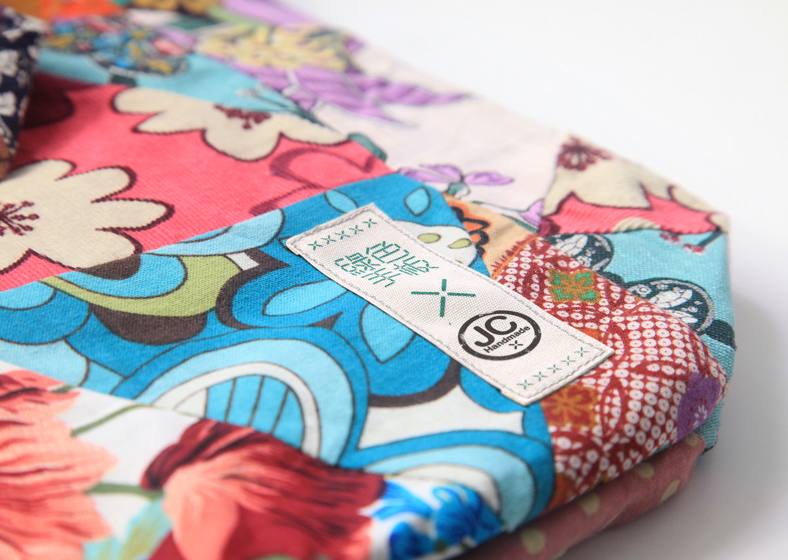 vertical label on specified size of merchandise with example logo of indivdual maker | Green Hands :: Branding and Packaging Design