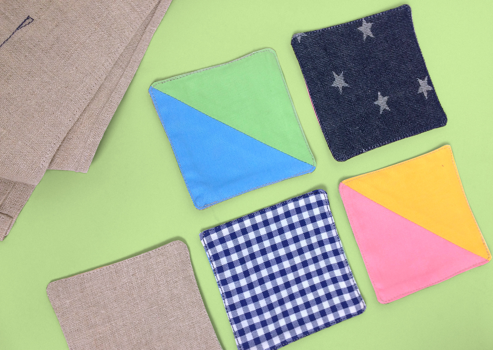 cup mats diagonal multi-fabric on one side and miscellenous fabric the other side, accessories merchandising, styling, uniform design, apron, blue white gingham check, zakka | Art Space with Vegetarian Café in Hong Kong : : Retail Identity and Zakka Creation